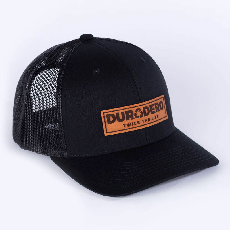 Low Profile Embossed Leather Logo Trucker Hat Black